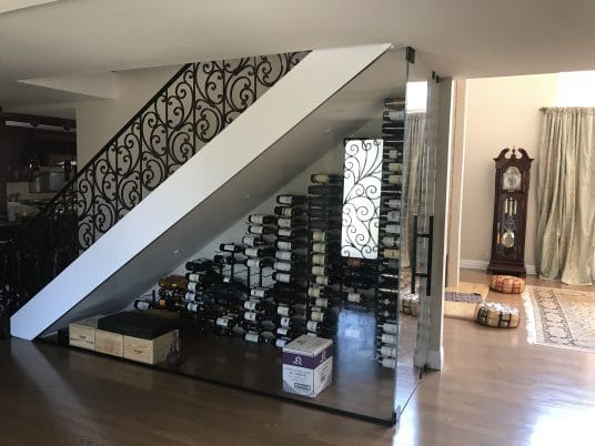 under stair modern glass wine cellar
